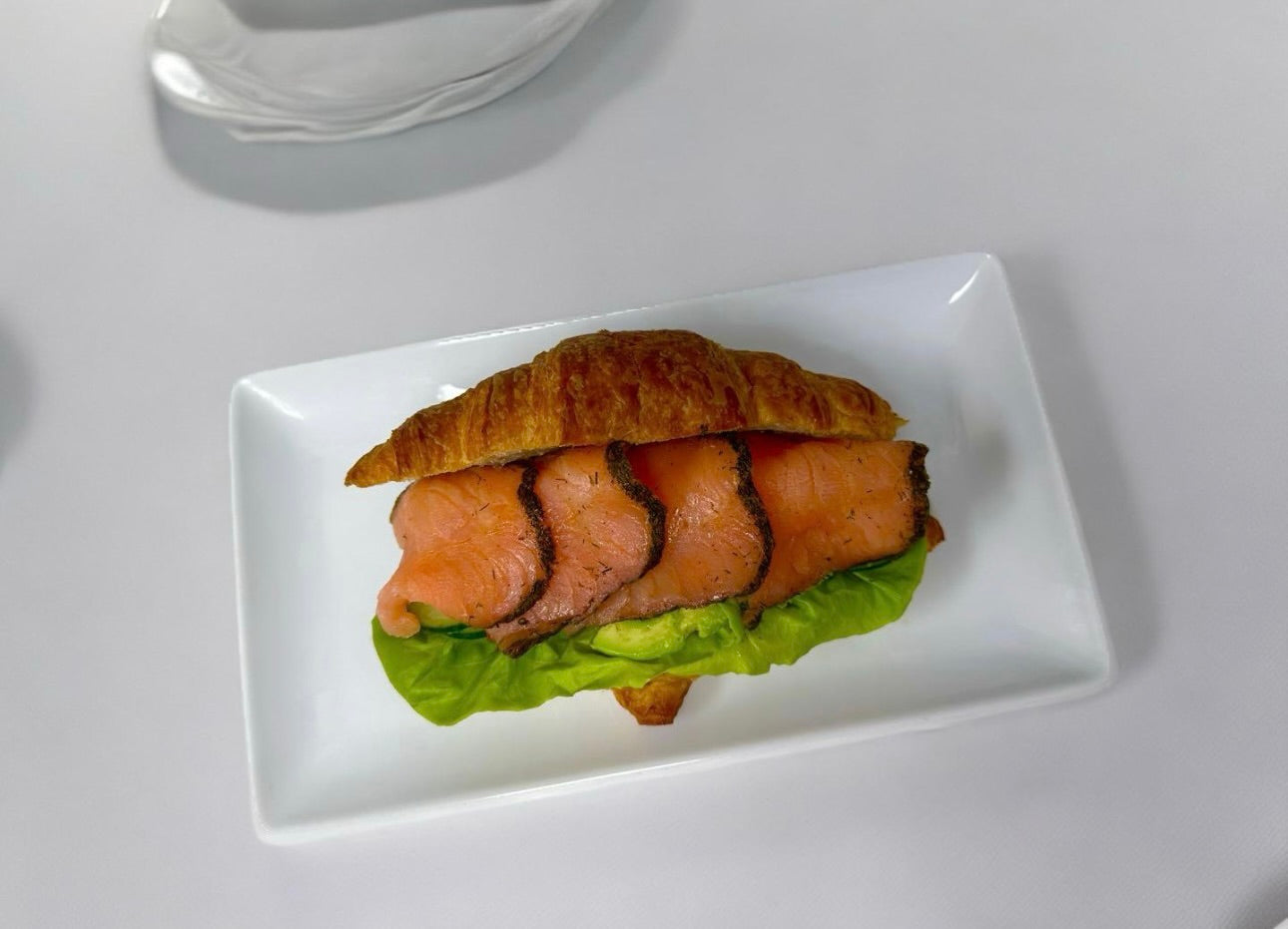 Fresh croissant with smoked salmon